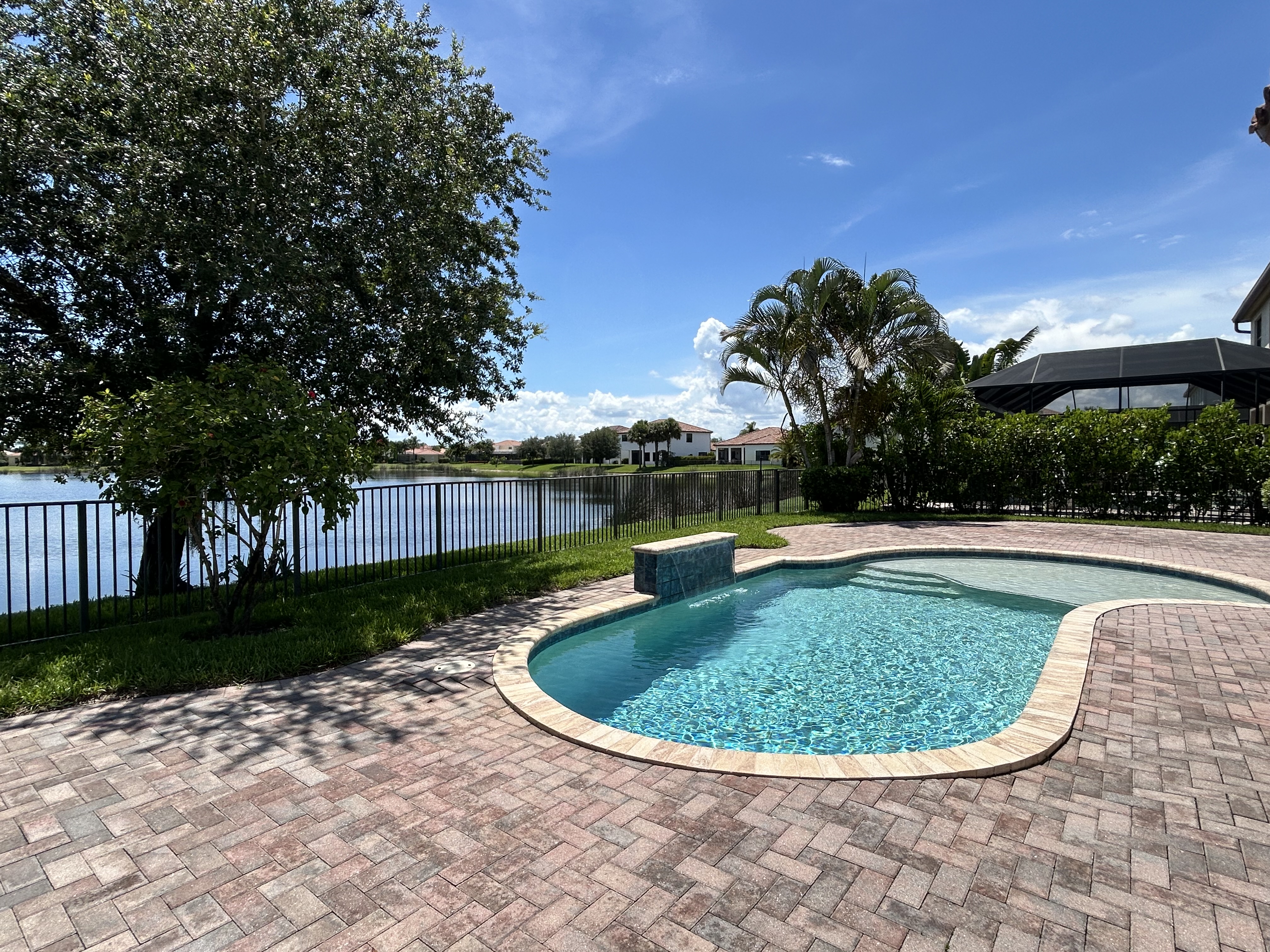 Private screened pool with lake view
